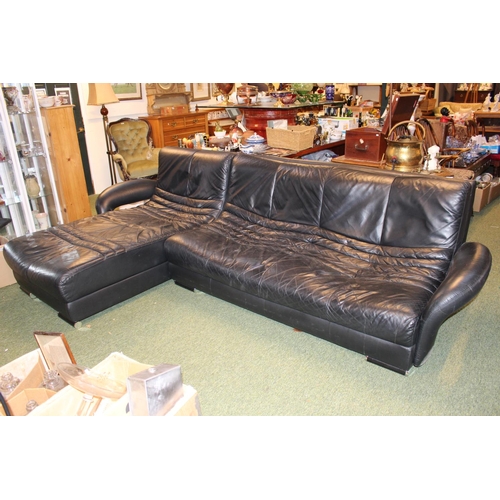 Long Black Leather L shaped sofa Suite on metal supports