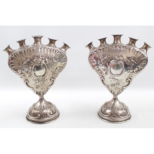 A Pair of Dutch Silver Tulip Vase, import marks for Chester 1902 of shaped design, all over detailed in relief, on circular footed base, 22cm high, 580g total weight
