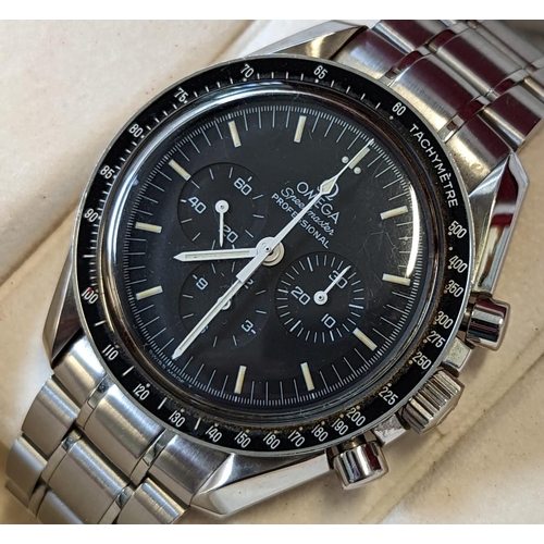 Omega Speedmaster Professional 'Moon Watch' stainless steel chronograph bracelet watch embossed with NASA moon landing tribute, 'Flight-Qualified by NASA for all Manned Space Missions The First Watch Worn on the Moon' comes with full papers and box