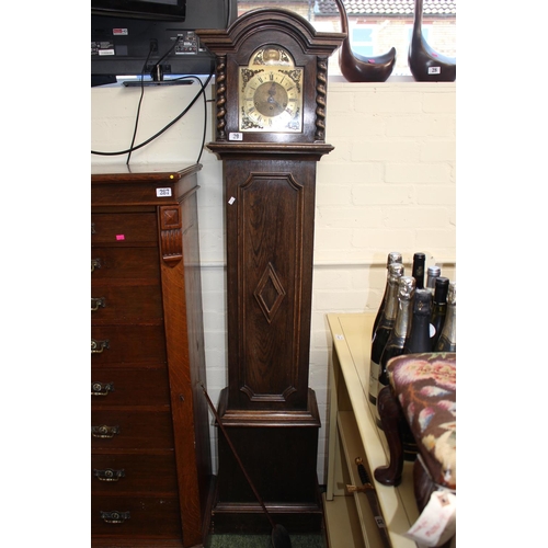 29 - Oak cased Grandmother clock with Brass Roman numeral dial