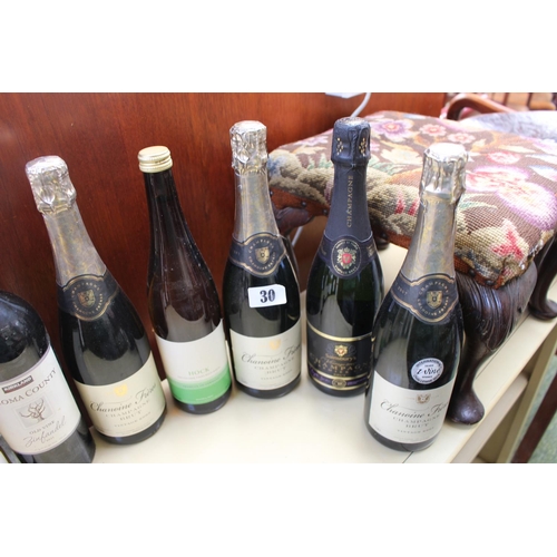 30 - Collection of assorted Wines and Champagnes inc Chanoine Freses, Chablis etc