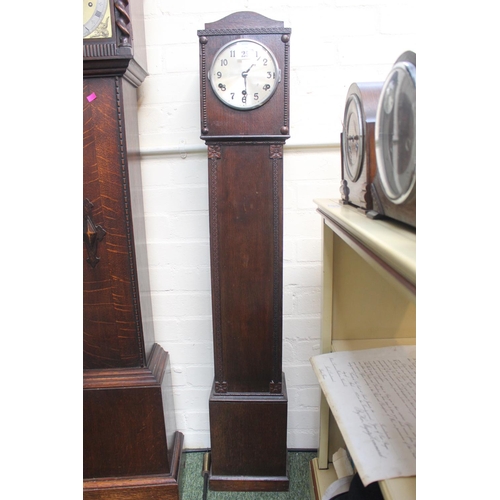 21 - Oak cased grandmother clock with numeral dial