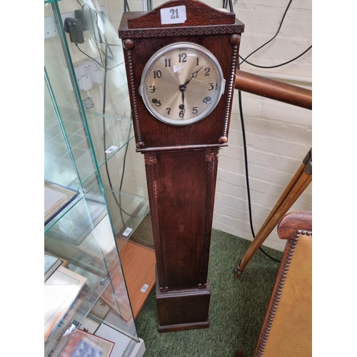 21 - Oak cased grandmother clock with numeral dial