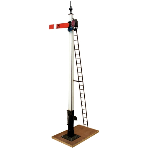 A miniature fully operational Great Northern Railway somersault signal, complete with lamp, ladder and finial. Overall height 74", the base marked Scaleway Signals. (Postage Band: N/A)