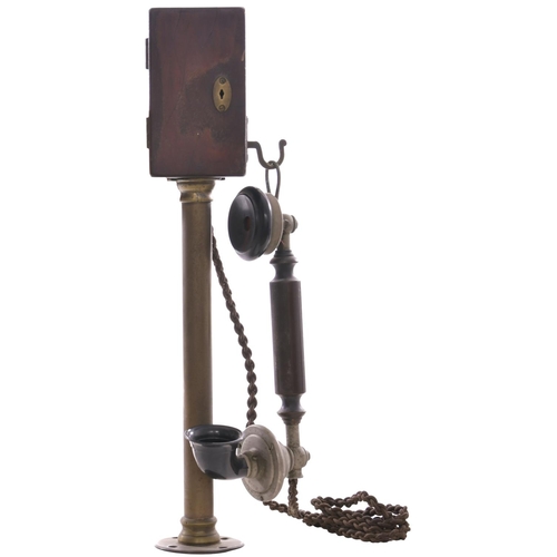 8 - A Midland Railway candlestick telephone, complete with brass stand and original combined ear and mou... 