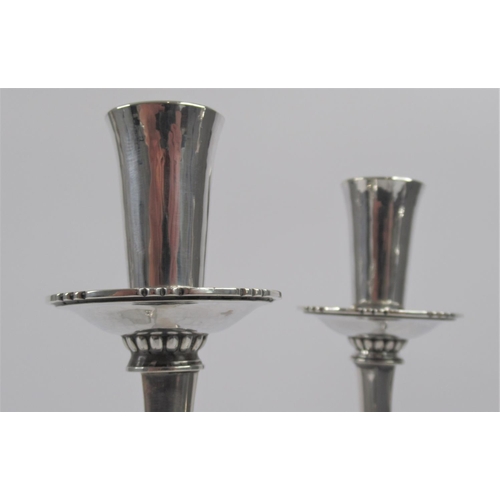 22 - A Very Good Pair of Silver Candelabra by R.E. Stone, hallmarked London 1956 and featuring the design... 