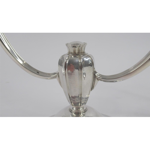 22 - A Very Good Pair of Silver Candelabra by R.E. Stone, hallmarked London 1956 and featuring the design... 