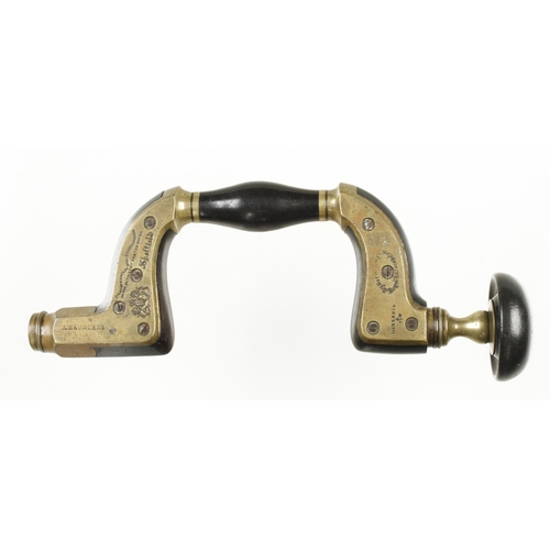 915 - A brass framed ebony brace by MARPLES with ivory ring in ebony head G+