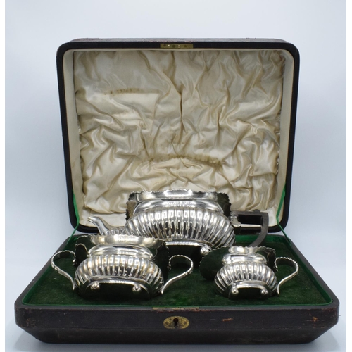 222 - Silver 3 piece tea set to include the teapot, milk and sugar: hallmarked for London 1905 (1120 grams... 