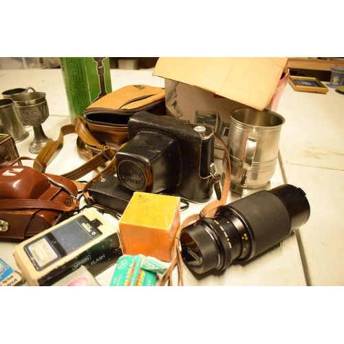 5R - A mixed collection of items to include camera equipment, tankards, novelty cigarette dispenser etc

... 