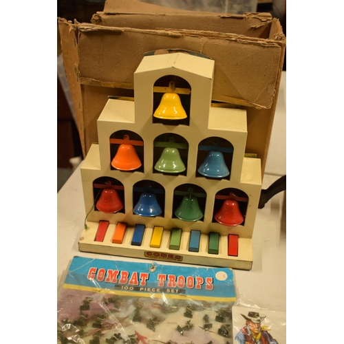 5T - A mixed collection of vintage toys to include dumper trucks, Codeg Melody Bells etc

Condition is mi... 