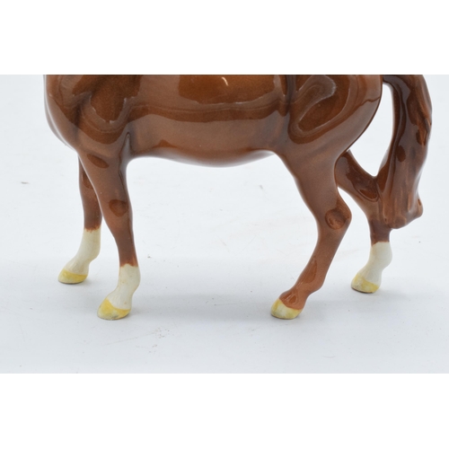 198 - Beswick chestnut head up pony 1197. 14cm tall. The piece displays well however there has been profes... 
