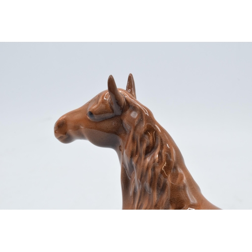 198 - Beswick chestnut head up pony 1197. 14cm tall. The piece displays well however there has been profes... 