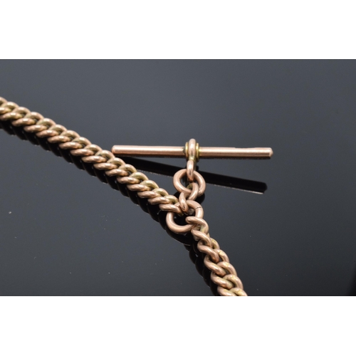 230 - Edwardian 9ct rose gold curb link Albert watch guard chain with T bar and clip. Each link stamped. 3... 