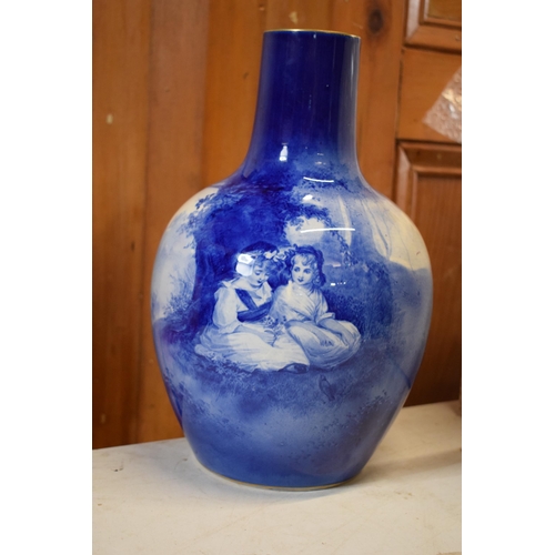 130 - Large Royal Doulton bulbous vase with Blue Children design. 30.5cm tall. In good condition with no o... 
