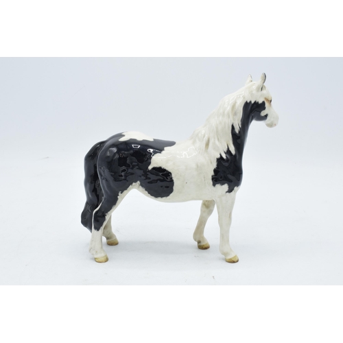 152 - Beswick piebald pinto pony 1373. In good condition with no obvious damage or restoration. Heavily cr... 