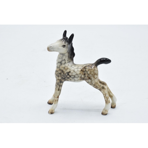 154 - Beswick small rocking horse grey outstretched foal 763. In good condition with no obvious damage or ... 