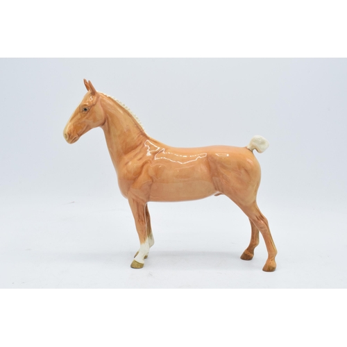 156 - Beswick palomino Hackney horse 1361. 20cm tall. In good condition with no obvious damage or restorat... 