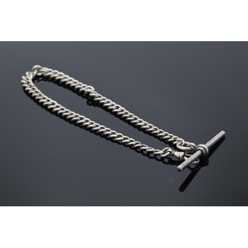 183 - A hallmarked silver Albert watch chain with T bar. 27.4 grams. Hallmark to each link. 32cm long.