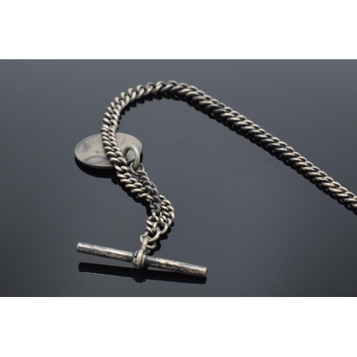 185A - Silver Albert watch chain with T bar, clip and coin fob. 40.6 grams. 36cm long.