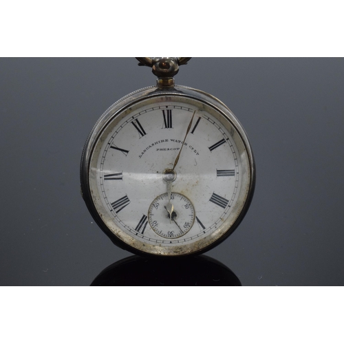 189 - Silver pocket watch with a key. Lancashire Watch Co Ltd. Prescot. Chester 1893.