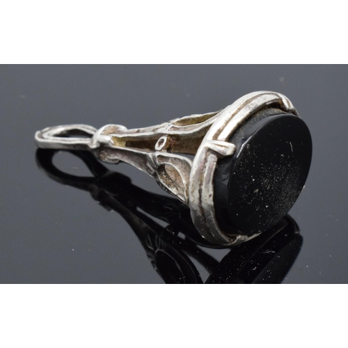 195 - A silver desk seal with onyx base.