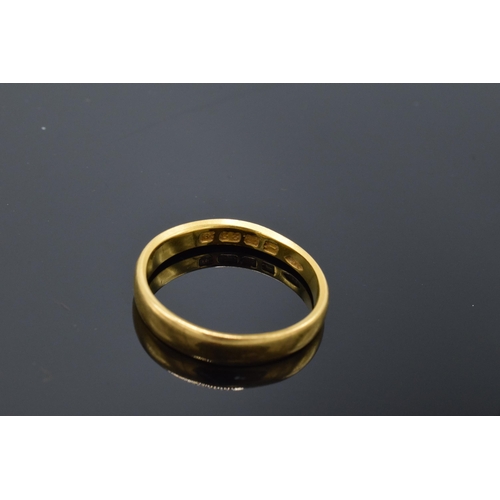 203G - A pair of 22ct gold wedding bands. 6.8 grams.
