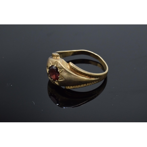 203N - 9ct gold ring set with a garnet. 4.1 grams. UK size Z. Slightly mis-shaped.