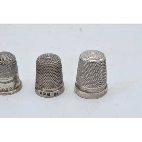209 - A collection of 5 silver thimbles to include 3 hallmarked, 1 sterling and 1 tested as silver (5). 18... 