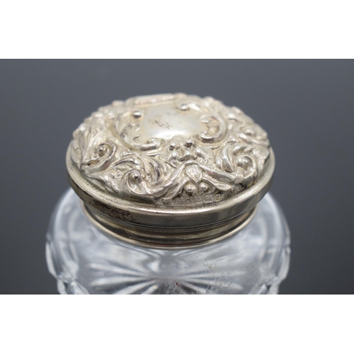 211 - Silver-topped ladies cosmetic jar, fine quality lid and crisp hallmark. Boxed.