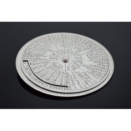 218 - Dutch silver perpetual calendar in a circular form with one side showing the amount of daylight, day... 