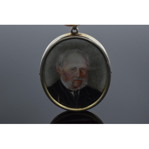 225 - 19th century (tested as) Silver framed miniature portrait of a gentleman. 7cm tall. Unsigned.