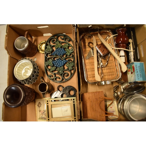 251A - A mixed collection of items to include metal trivets, jelly moulds, a lampbase, ash tray etc. NO POS... 