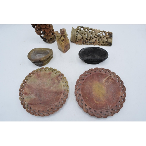 38 - A collection of 19th century soapstone items to include figures, bowls and similar to include a seal... 