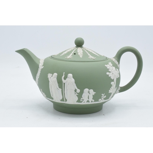 57 - Wedgwood Sage Green Jasperware teapot. In good condition with no obvious damage or restoration.
