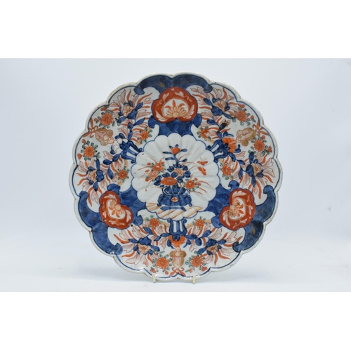 61 - A collection of oriental pottery to include 19th century Japanese items such as a shell shaped Imari... 