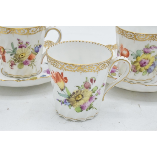 62 - A collection of Dresden fine bone china to include a pair of cups and saucers together with 3 cups a... 