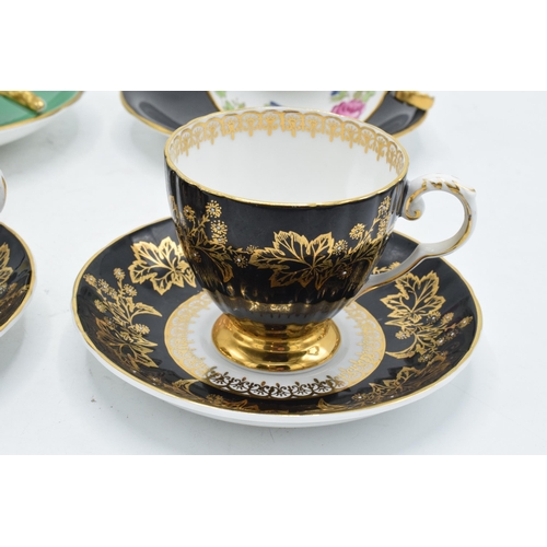 85 - A collection of tea ware to include cups and saucers such as Aynsley Orchard gold, a similar Aynsley... 