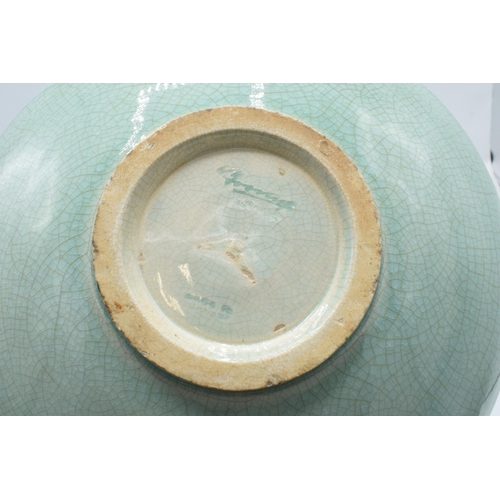 93 - Moorcroft shallow bowl with crackle glaze decoration, indistinctly signed Moorcroft. 22cm diameter. ... 