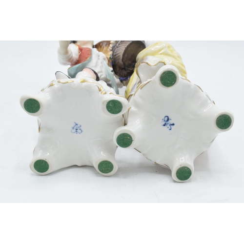 99 - A pair of Rudolf Kammer continental porcelain figures of grape pickers (2).  In good condition with ... 