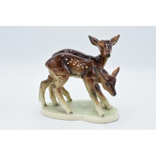 148B - A 20th century German porcelain figure of a pair of deer. 2215. Good detailing and quality. In good ... 