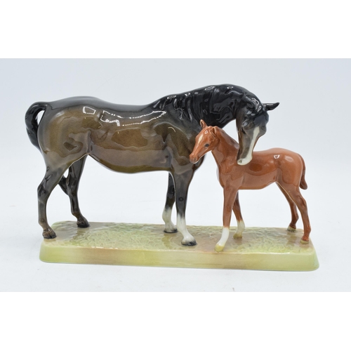 148O - Beswick Mare and Foal on base: Beswick brown mare with Chestnut foal on ceramic grass base 1811. In ... 