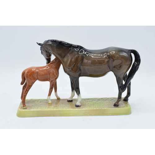 148O - Beswick Mare and Foal on base: Beswick brown mare with Chestnut foal on ceramic grass base 1811. In ... 