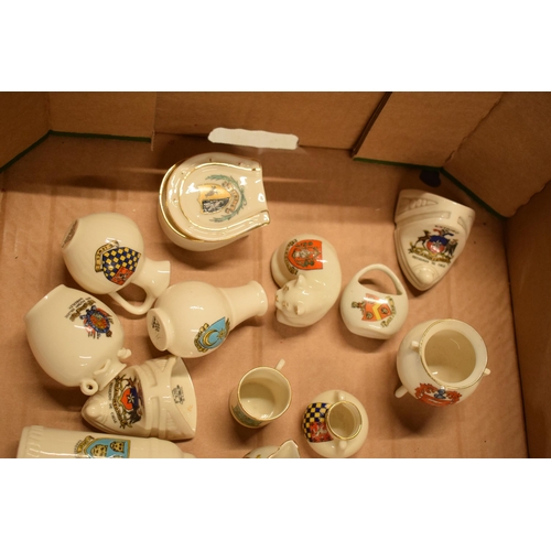 4 - A mixed collection of crested china items to include vases, jugs, trinkets, a pair of stirrups, a sh... 