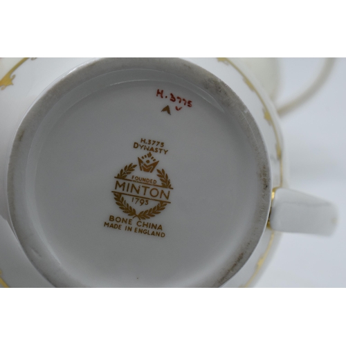 68 - A collection of Minton bone china tea ware in the Dynasty pattern to include a teapot, milk jug and ... 