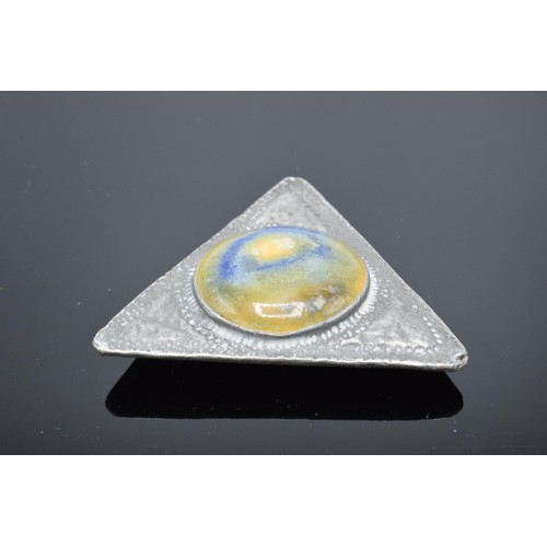 210J - Silver Liberty and Co (or in the style of) triangular brooch set with Ruskin cabochon style insert. ... 