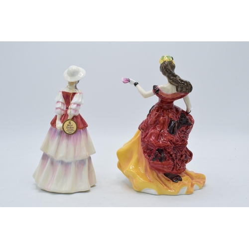 115 - A pair of Royal Doulton lady figures to include Belle HN3703 with cert and Eliza HN3179 (2).