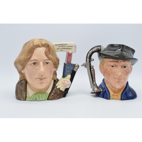 127 - A pair of Large Royal Doulton character jugs to include The Antique Dealer D6807, signed by Kevin Fr... 