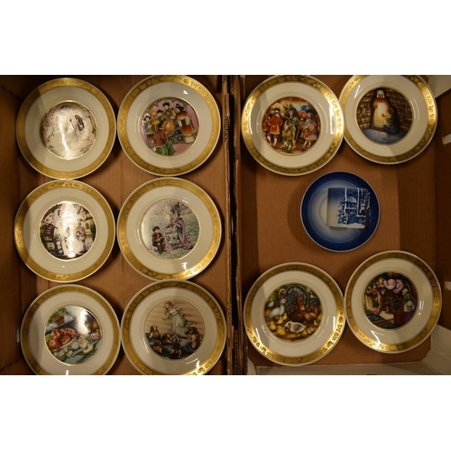 183 - A collection of Royal Copenhagen Hans Christian Anderson plates x 10 together with a blue cup and sa... 