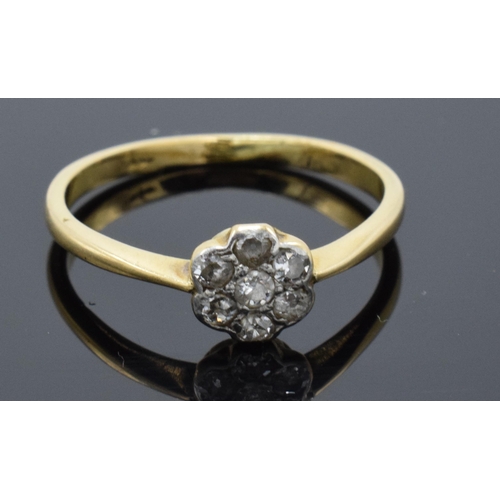 207 - 18ct gold and platinum daisy ring set with diamonds, 2.1 grams. Size O/P.